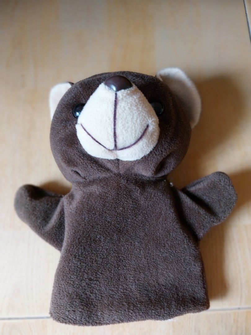 Brown Teddy Bear Hand Puppet (Category: Toys & Games) located in Singapore. Submitted by pui5754 (Listing ID 1440988519, Image 2). Description: - Cute brown teddy bear hand puppet - Soft plush material - Large opening fits adult hands - Ideal for storytelling and playtime - Fun for kids and adults.