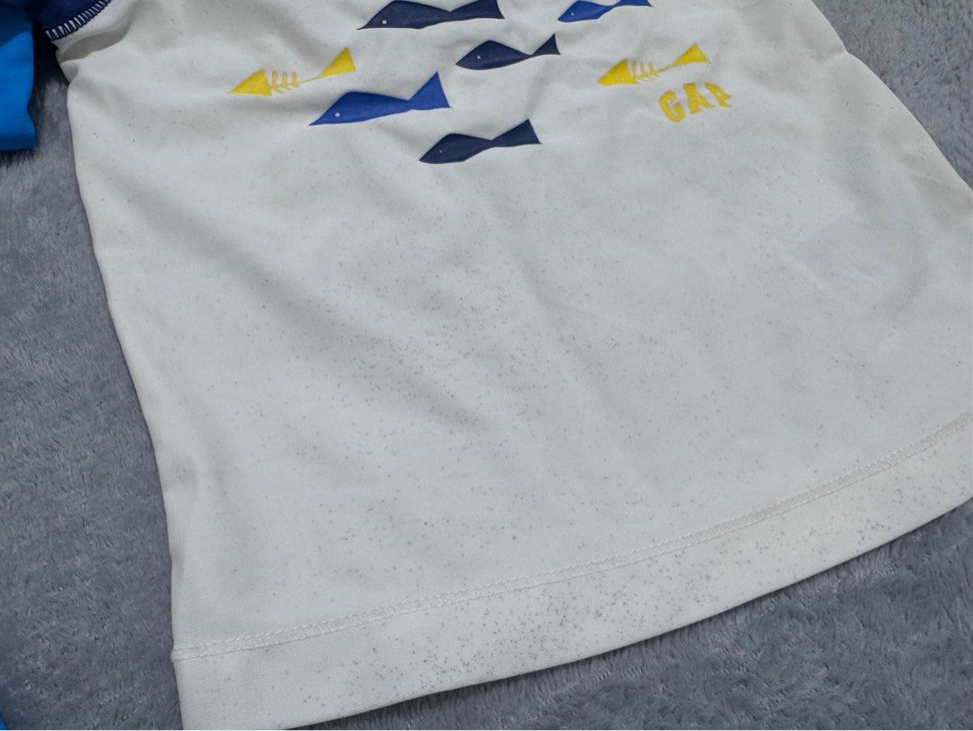 BUNDLE!! Rash Guard and Swim Shorts (Category: Babies & Kids Fashion) located in Binan City. Submitted by ynabliss (Listing ID 1441065650, Image 2). Description: - Ideal for beach days and pool fun - Stain on Gap swimwear (as shown on 2nd photo).