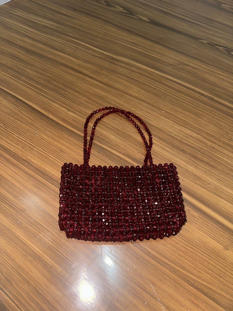 Burgundy Beaded Hand Bag (Category: Clutches) located in Quezon City. Submitted by smileybeans (Listing ID 1441039041, Image 1). Description: Available for same day delivery Shipping 55 within mm and 165 provincial.