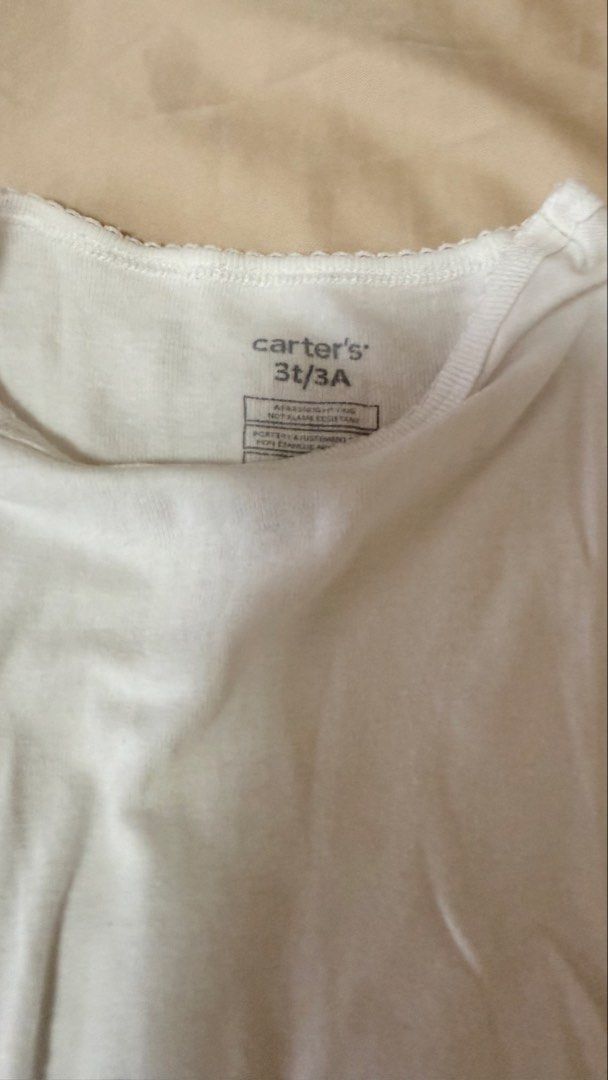 Carter's Unicorn Rainbow Pajama Set 3T (Category: Babies & Kids Fashion) located in Cainta. Submitted by carlaloo07 (Listing ID 1440984911, Image 2). Description: - Brand: Carter's - Size: 3T - Set includes: White t-shirt with unicorn, rainbow, and clouds graphic - Pants: Blue with white polka dots - Material: Comfortable for sleep.