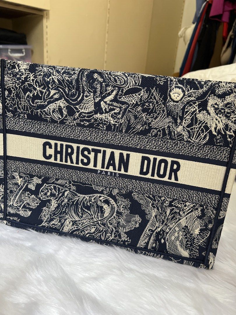 Book Tote Bag with serial (Category: Luxury Bags & Wallets) located in Pasay City. Submitted by imlilkittykat (Listing ID 1441010854, Image 1). Description: - Authentic Christian Dior Paris tote bag fromJAPAN Pamigay sale declutering this is brandnew - Features the iconic Dior signature pattern all over - Spacious interior with a convenient central compartment - Handles are still protected with original plastic wrap - Ideal for everyday use or tr