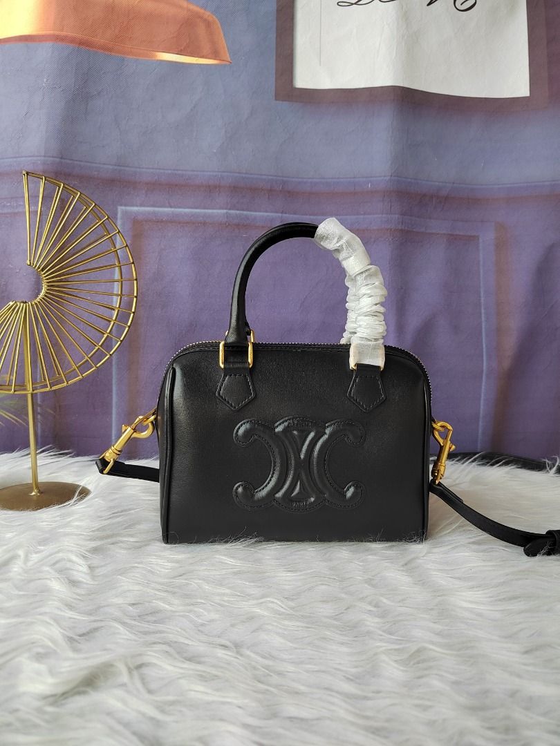 C*line Boston Bag (Category: Luxury Bags & Wallets) located in Caloocan City. Submitted by bbagsandpreloved (Listing ID 1441079159, Image 2). Description: Ce*line Boston Bag Black Height: Approximately 15.5cm Width: Approximately 19.5cm Depth: Approximately 10.5cm Shoulder: Approximately 104-120cm.