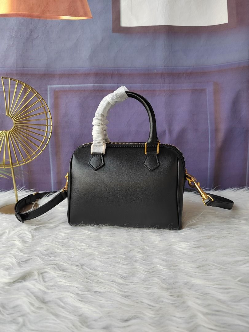 C*line Boston Bag (Category: Luxury Bags & Wallets) located in Caloocan City. Submitted by bbagsandpreloved (Listing ID 1441079159, Image 3). Description: Ce*line Boston Bag Black Height: Approximately 15.5cm Width: Approximately 19.5cm Depth: Approximately 10.5cm Shoulder: Approximately 104-120cm.