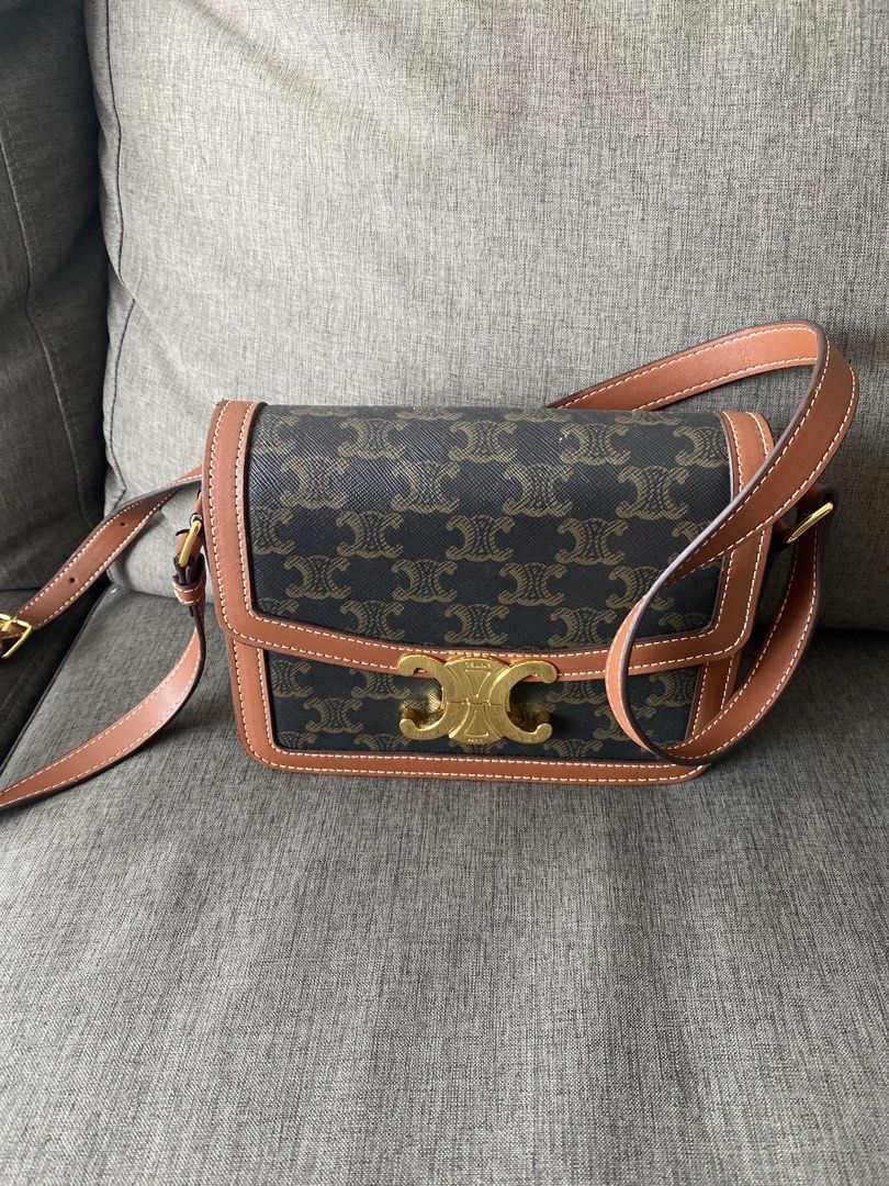 Celine Triomphe Canvas Crossbody Bag (Category: Luxury Bags & Wallets) located in Quezon City. Submitted by viber9163490242 (Listing ID 1441019245, Image 2). Description: - Authentic Celine Triomphe crossbody bag - Iconic Triomphe canvas print - Brown leather trim and strap - Gold hardware closure - Interior zippered pocket - Perfect for everyday or special occasions - Clean inside and out - Comes with original dust bag.