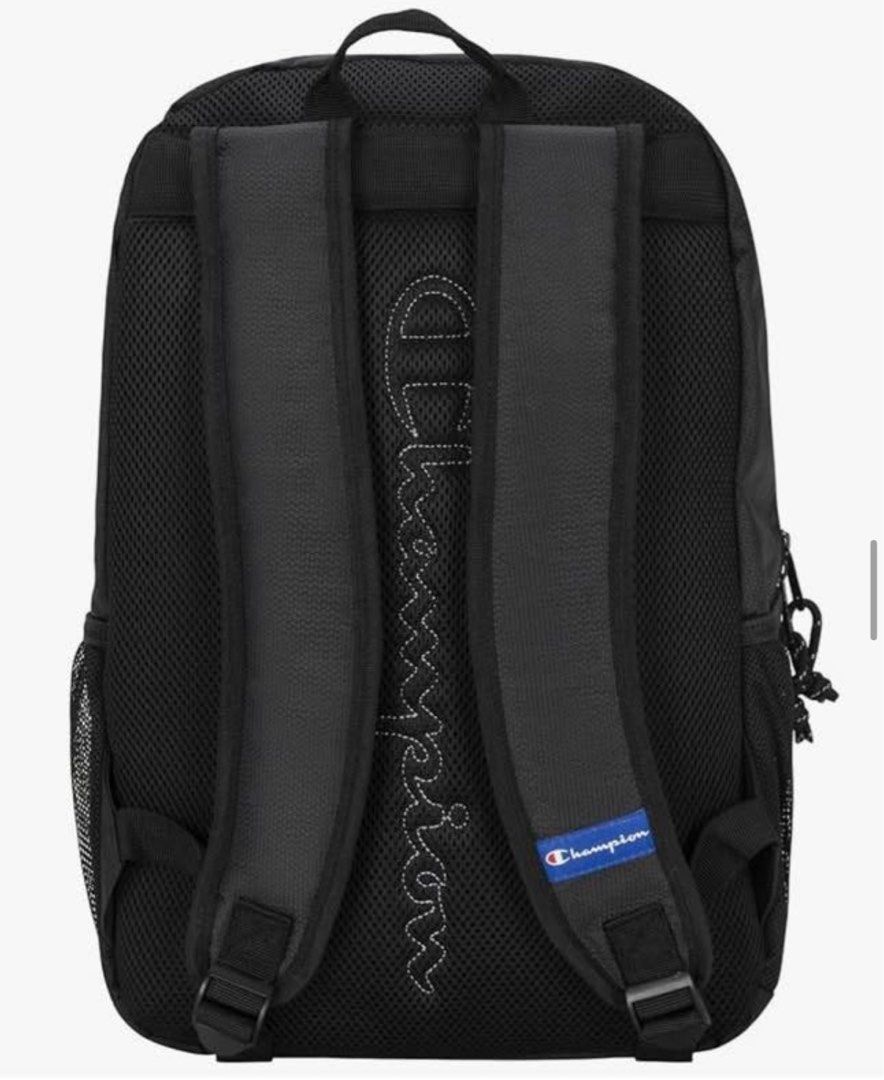Champion Backpack Black (Category: Backpacks) located in Pasig City. Submitted by shopwithelle__ (Listing ID 1441139950, Image 3). Description: - Classic black Champion backpack - Features iconic Champion logo on the front - Spacious main compartment with a vibrant blue interior - Includes a convenient inner mesh pocket - Padded shoulder straps for maximum comfort - Dual side mesh pockets, ideal for water bottles - Versatile for school, work, or 