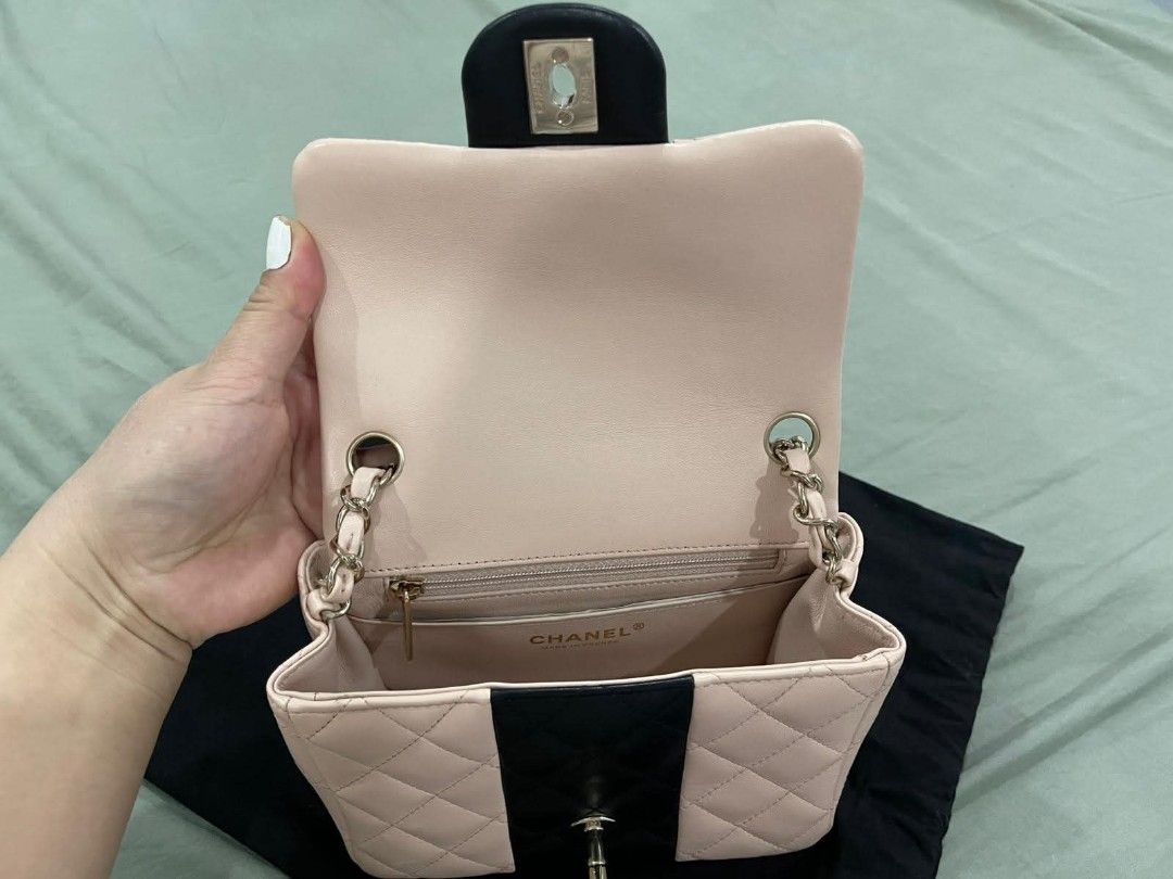 Chanel Classic Flap Bag Beige and Black (Category: Luxury Bags & Wallets) located in Quezon City. Submitted by melmgpy (Listing ID 1441129221, Image 2). Description: - Authentic Chanel bag - Color block design: Beige and Black - Material: Quilted leather - Hardware: Gold chain strap - Closure: Classic flap with CC logo - Interior: Zipper pocket and slip pocket - Includes: Original dust bag - Versatile: Ideal for day or night use Classic Mini squa