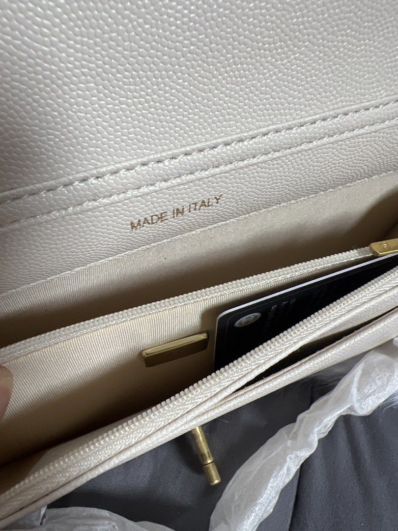 Wallet on Chain Beige Caviar Leather Gold Hardware (Category: Luxury Bags & Wallets) located in Pasay City. Submitted by imlilkittykat (Listing ID 1440989097, Image 3). Description: - WOC from japan Super bango ng leather ang ganda in person - Color: Beige - Material: Caviar Leather - Hardware: Gold - Design: Quilted - Origin: Made in Italy - Includes: authenticity cards and papers inside lang - Serial number visible in photos plus microchipped n