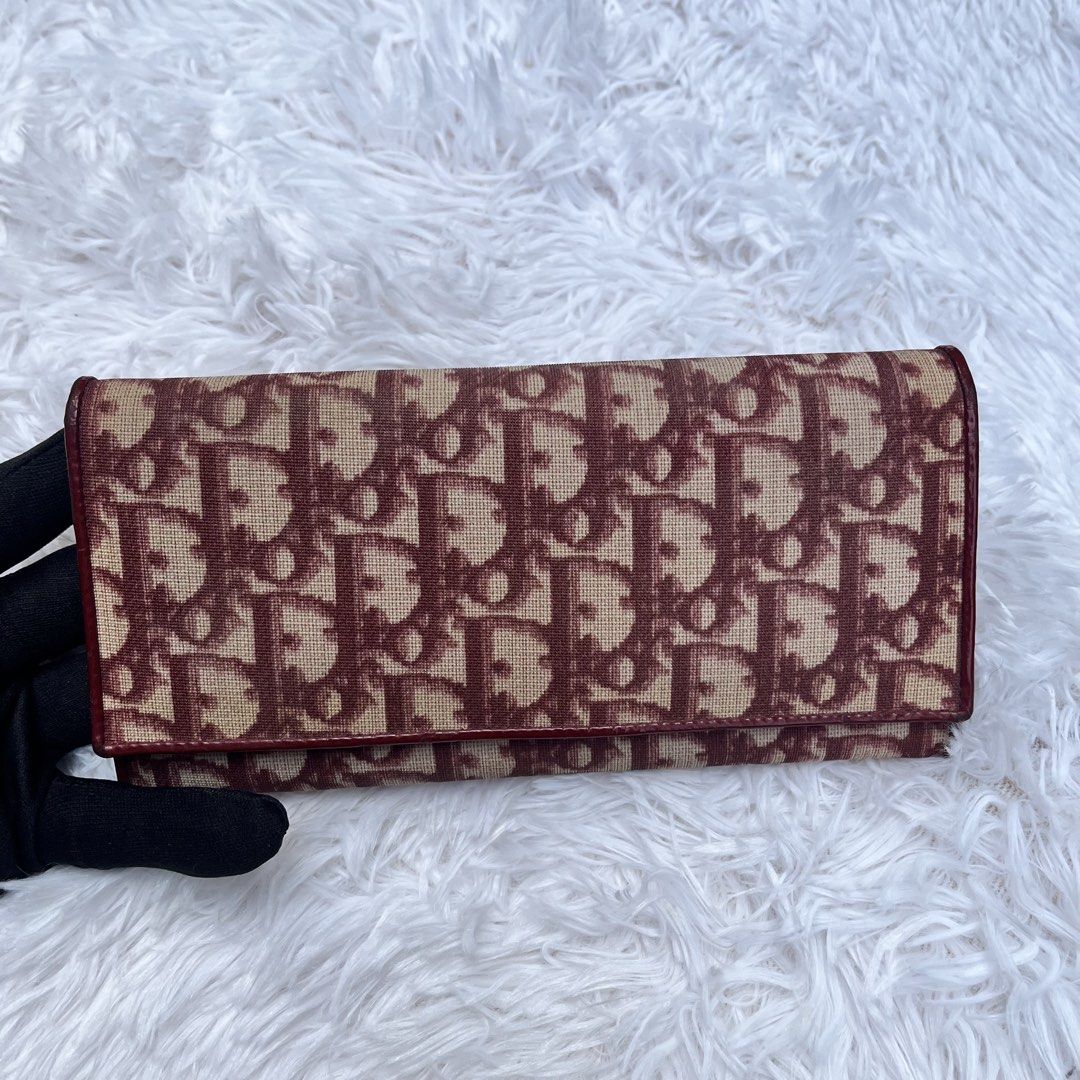 Christian Dior Monogram OBLIQUE LONG WALLET (Category: Luxury Bags & Wallets) located in Manila. Submitted by contemporarydripstore (Listing ID 1440964629, Image 2). Description: - Authentic Christian Dior wallet - Iconic red and beige Diorissimo monogram canvas - Genuine leather trim and interior - Secure snap closure - Ample card slots and compartments for organization - A timeless and practical piece for daily use WTS DIOR OBLIQUE LONG WALLET 