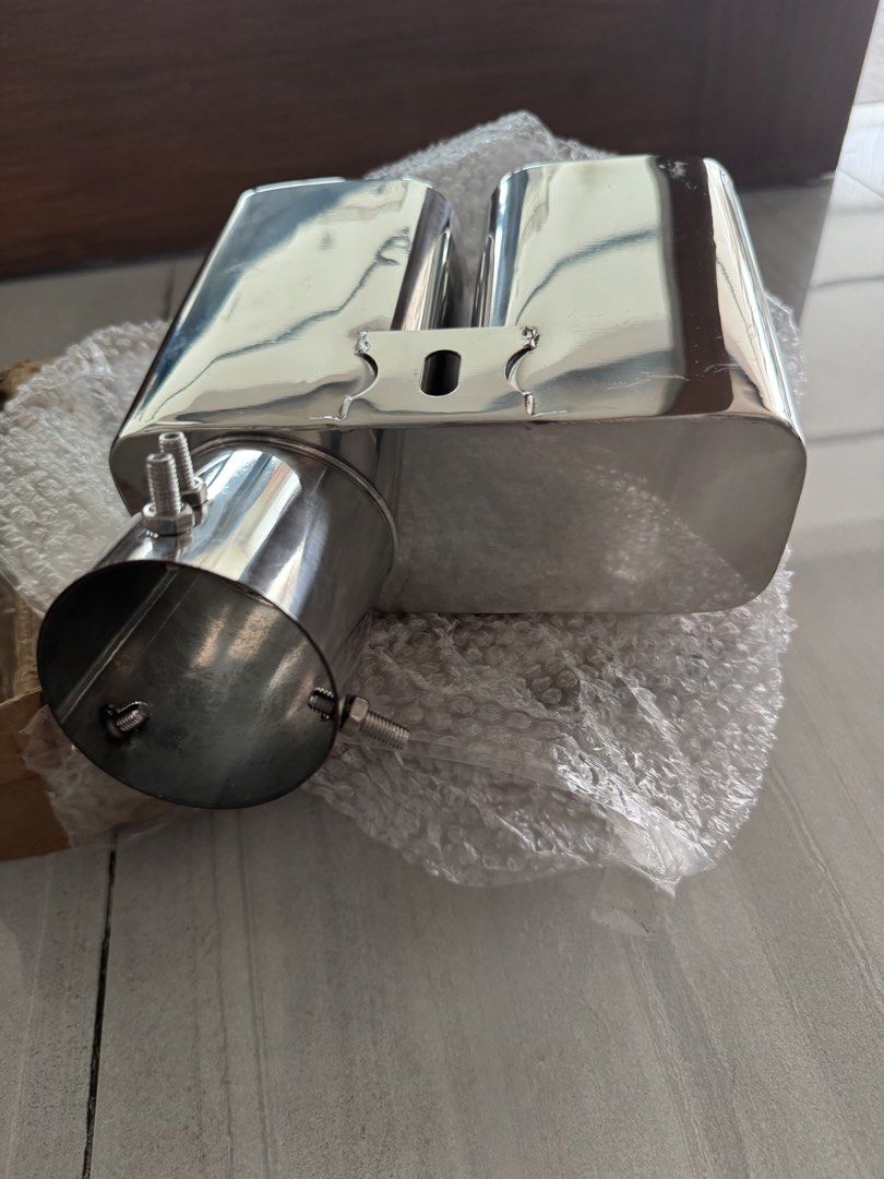 Chrome Dual Outlet Exhaust Muffler Tip (Category: Mufflers and Exhaust Parts and Accessories) located in Makati City. Submitted by gonz4669 (Listing ID 1440962119, Image 3). Description: - Universal dual exhaust tip for a sporty look - Made from durable, polished stainless steel - Secure clamp-on installation with screws - Fits most vehicle models .