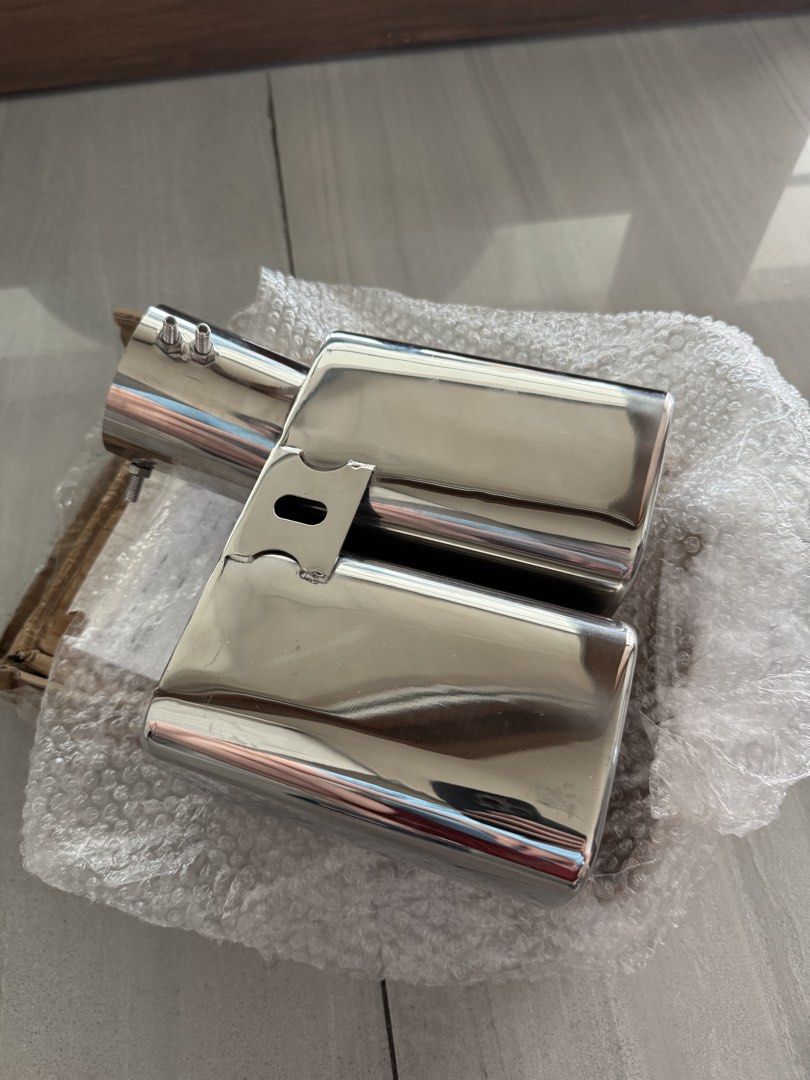 Chrome Dual Outlet Exhaust Muffler Tip (Category: Mufflers and Exhaust Parts and Accessories) located in Makati City. Submitted by gonz4669 (Listing ID 1440962119, Image 2). Description: - Universal dual exhaust tip for a sporty look - Made from durable, polished stainless steel - Secure clamp-on installation with screws - Fits most vehicle models .