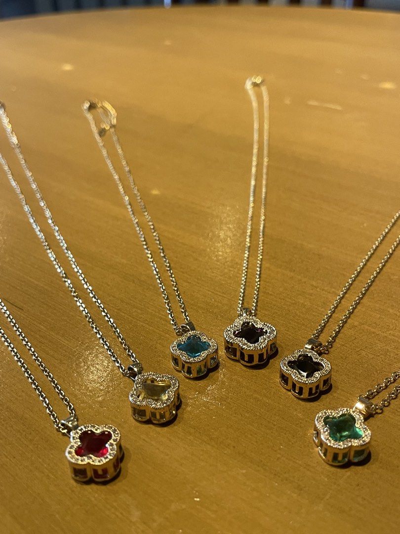 Clover Pendant Necklace with Gemstones (Category: Necklaces) located in Pasig City. Submitted by jewelsbymac (Listing ID 1441008677, Image 1). Description: Details: ✔ Material: High quality Stainless Steel with gold tone finish — does not tarnish, fade or rust ✔ ✔ Design: Beautiful heart/clover shaped pendant, surrounded by tiny sparkling accents ✔ Stone: Genuine semi-precious stones, smooth and vibrant color ✔ Chain: Dainty, thin and lightweight