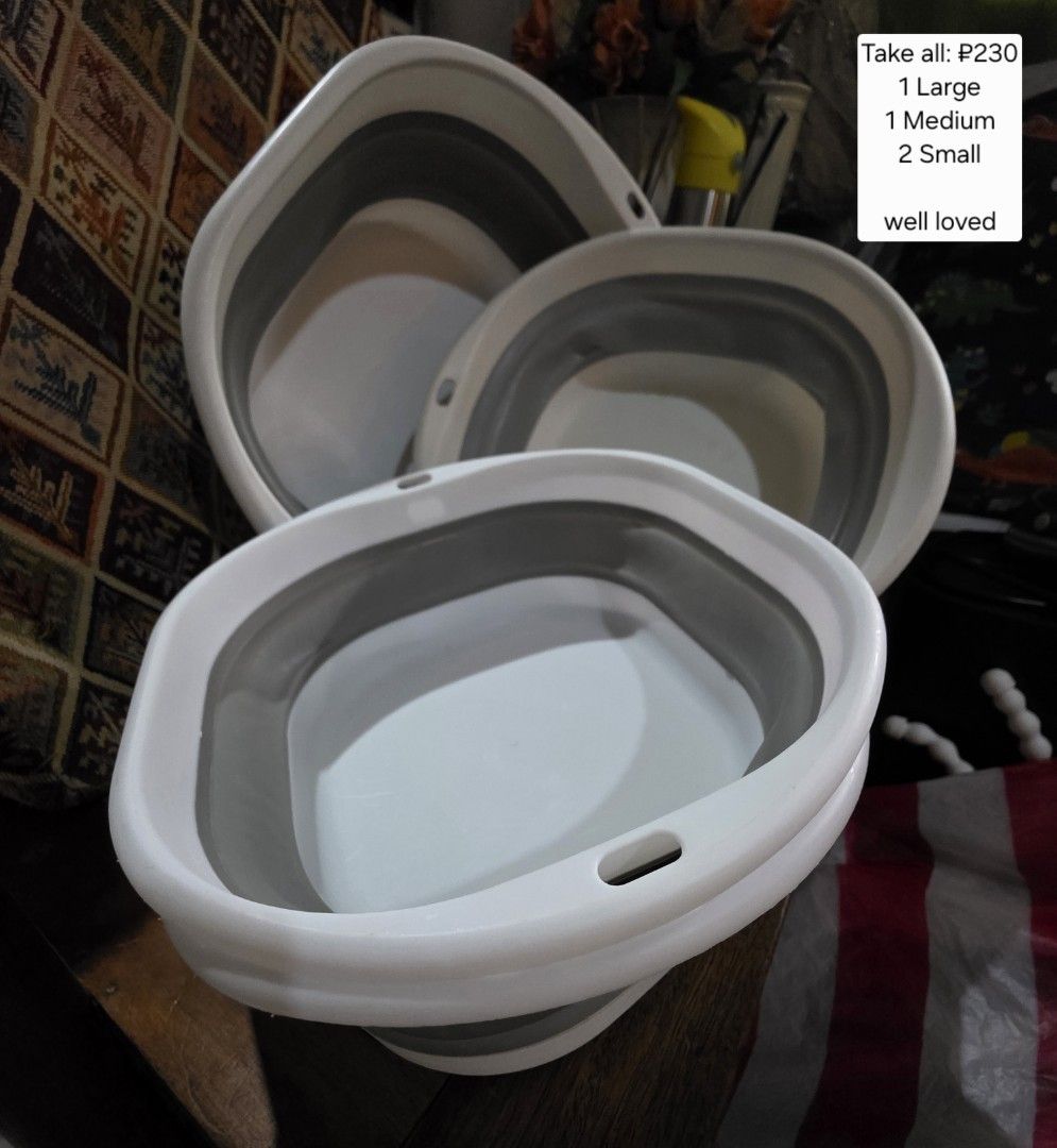 Collapsible Basin Set - 3 Pieces (Category: Cleaning Tools & Supplies) located in Manila. Submitted by pre.loved.declutterx (Listing ID 1439624773, Image 1). Description: - Set of four collapsible basins - Sizes: 1 large, 1 medium, 1 small - Color: White with gray accents - Condition: Used, but well-maintained - Perfect for various household tasks - Price: P200 for all.