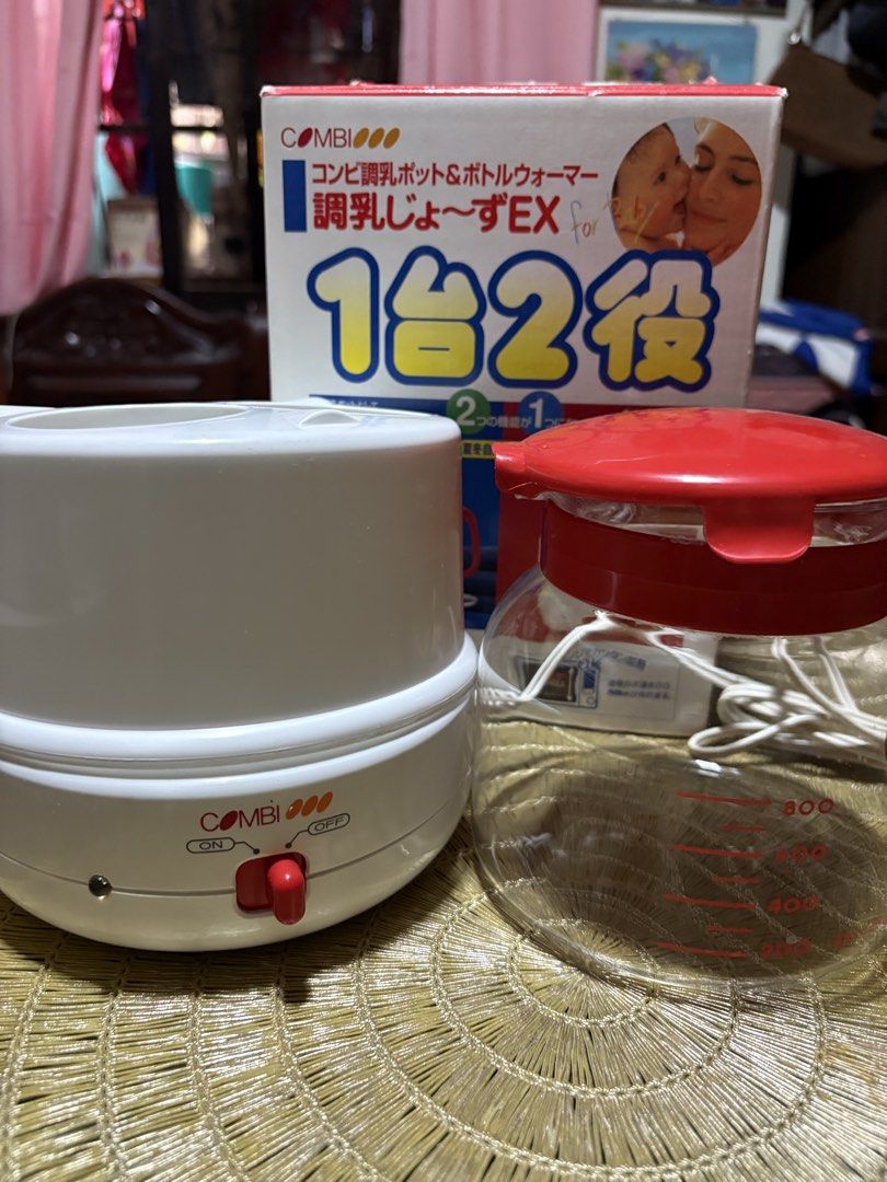 Combi 1-2 Function Milk Warmer & Bottle Warmer (Category: Breastfeeding & Bottle Feeding) located in Binan City. Submitted by treasurejoycollection (Listing ID 1441077732, Image 3). Description: Untested Japan Auction House.