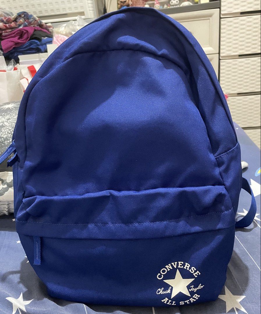 Converse All Star Blue Backpack (Category: Backpacks) located in Quezon City. Submitted by stuffsrus (Listing ID 1441146523, Image 1). Description: Classic blue Converse backpack. Simple design with the iconic Chuck Taylor All Star logo on the front. Has a main compartment and a front pocket. Straps are adjustable. Great for everyday use or school..