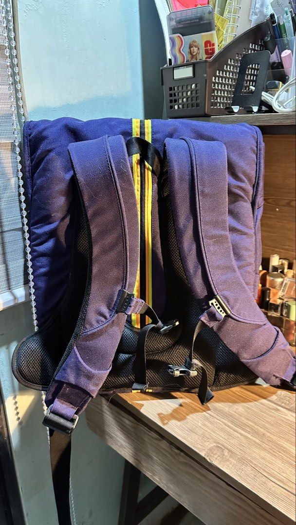 Crumpler "Bag Bride" Laptop Backpack (Category: Backpacks) located in Manila. Submitted by moncurr (Listing ID 1440955745, Image 2). Description: Crumpler “Bag Bride” Laptop Backpack (Yellow/Purple) — Heavy Duty Retail price: ₱6,500-8,500 Price: ₱2,800 (negotiable for fast takers) - Authentic - Ultra-tough water-resistant exterior fabric with a purple grid-pattern ripstop lining - Large main compartment with a dedicated padded laptop sleeve area.