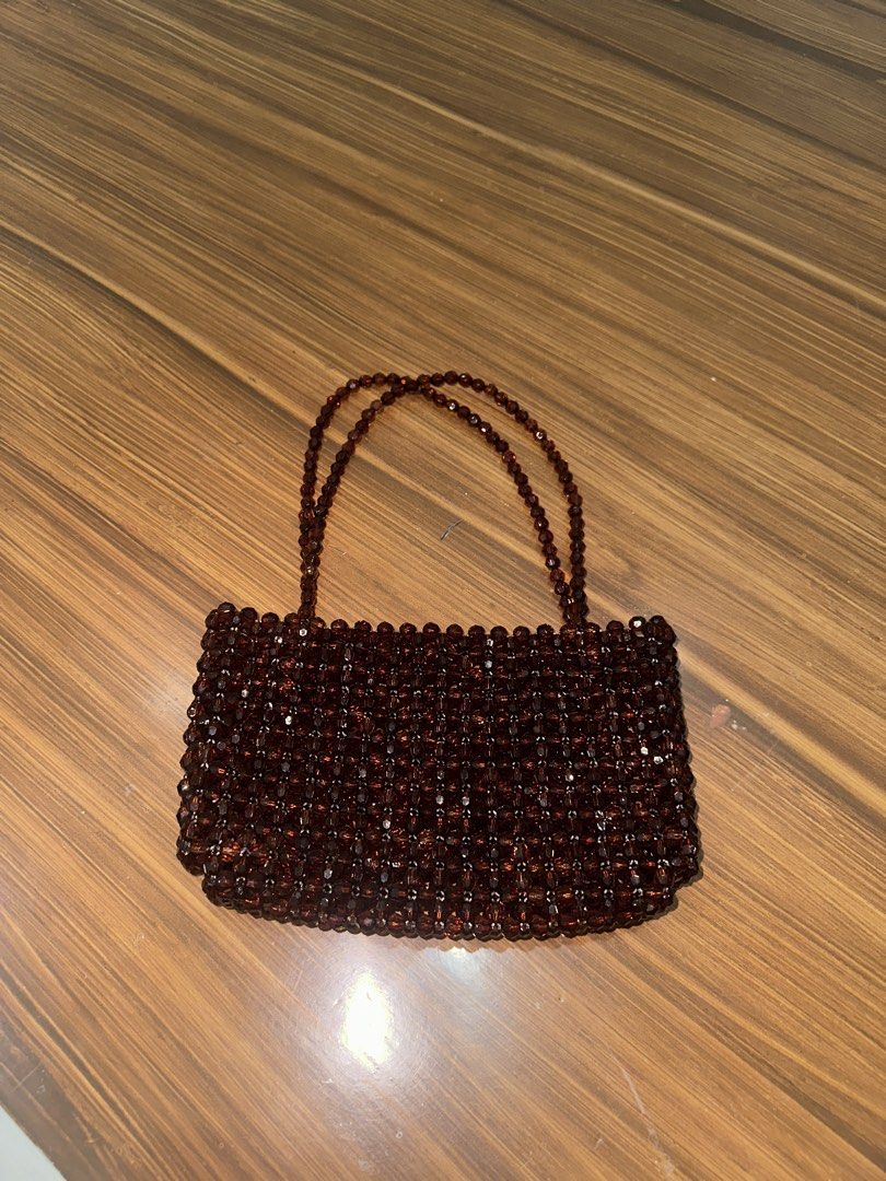 Dark Brown Crystal Beaded Hand Bag (Category: Clutches) located in Quezon City. Submitted by smileybeans (Listing ID 1441038747, Image 1). Description: Available for same day delivery Shipping 55 within mm and 165 provincial.