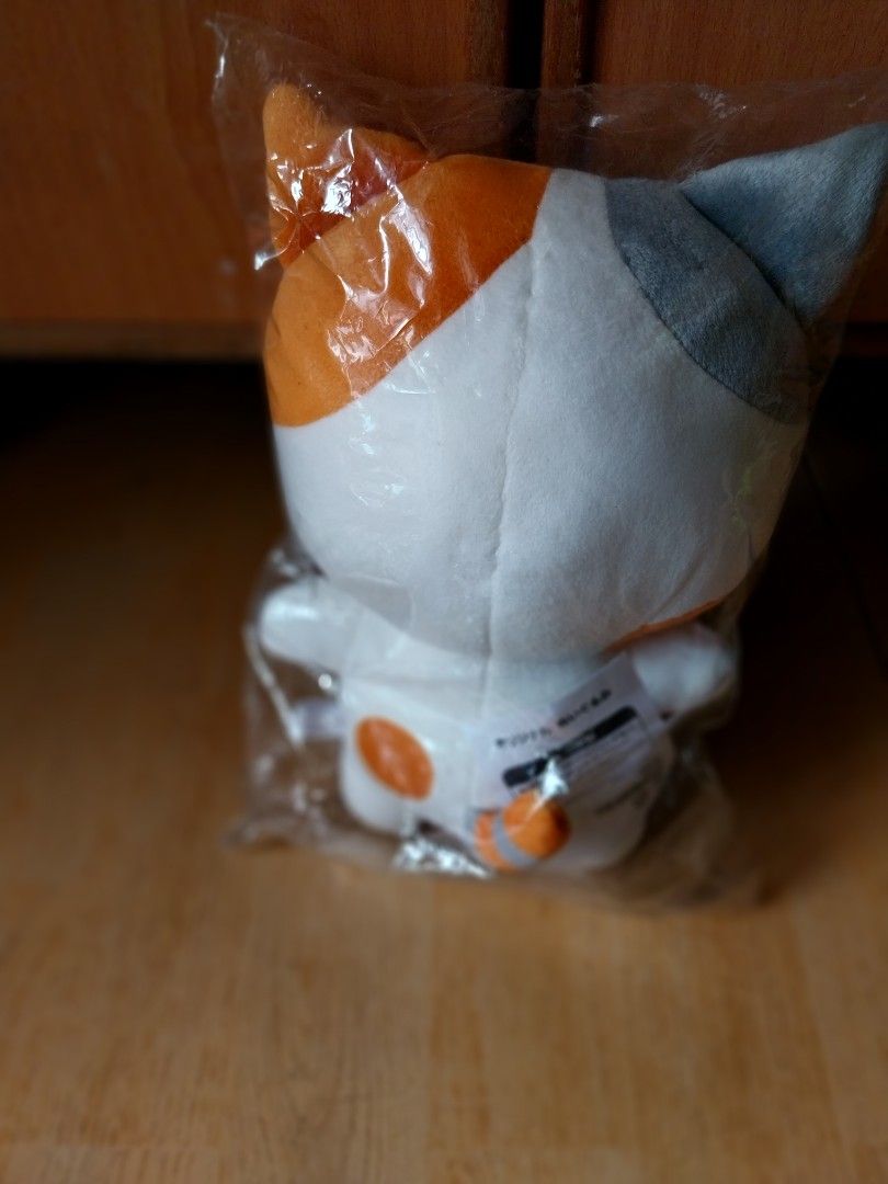 Cute Cat Plush Toy (Category: Toys & Games) located in Singapore. Submitted by pui5754 (Listing ID 1440988623, Image 2). Description: - Adorable calico cat plush toy - Super soft and cuddly - Brand new, in original packaging - Ideal for collectors or as a gift - Approx. [insert size if known].
