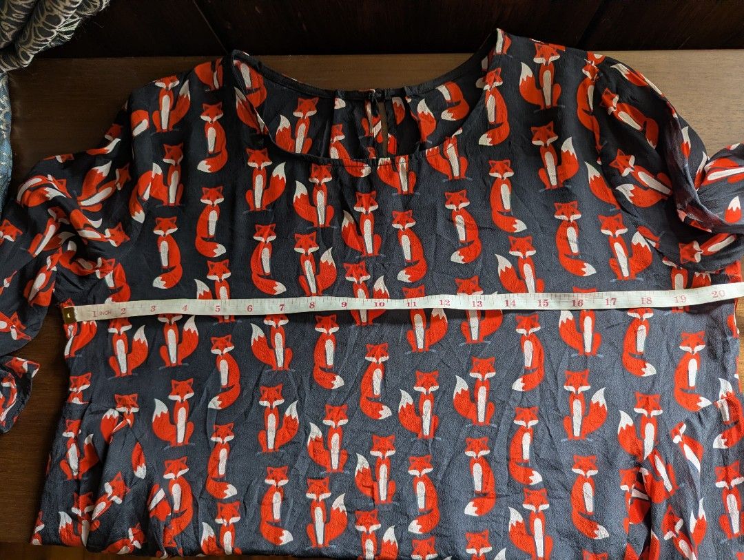 DARK BLUE BELL SLEEVE TOP FOX PRINT SEMI-SHEER FABRIC MANIPIS (Category: Blouses) located in La Trinidad. Submitted by beadtales (Listing ID 1441081840, Image 3). Description: - Adorable dark blue top with a playful red and white fox print. - Features trendy bell sleeves for a stylish touch. - Lightweight and flowy fabric, ideal for casual wear. - Approximate measurements: Chest 20 inches, Length 25 inches. 🌌 Aʟᴡᴀʏꜱ ʀᴇᴀᴅ 𝐂𝐚𝐫𝐞 𝐋𝐚𝐛𝐞𝐥/𝐖𝐚