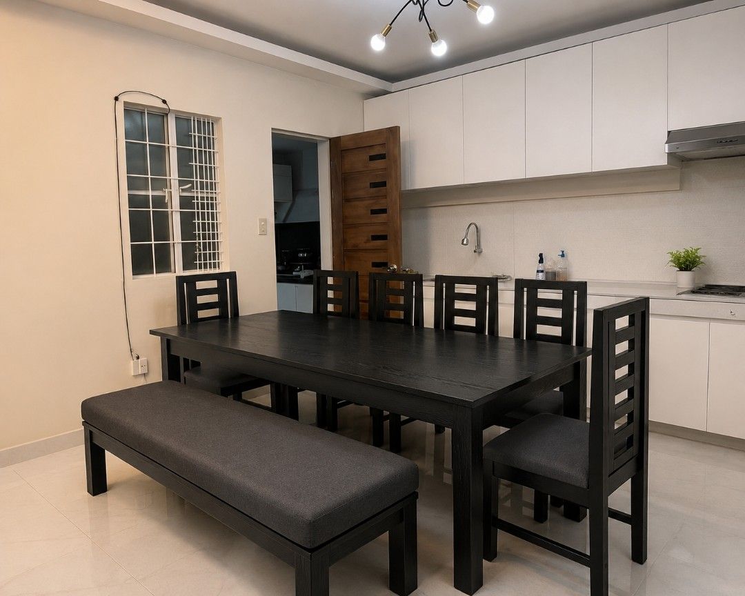 Dark Wood Dining Table with 6 Chairs and Bench (Category: Tables & Sets) located in Mabalacat. Submitted by joemamangun01 (Listing ID 1440957882, Image 1). Description: Selling a dark wood dining set. Includes a long table, six chairs with upholstered seats, and a matching bench. Seats up to 8 people comfortably. Great for family dinners or entertaining guests. The dark finish is sleek and modern. Chairs have a slatted back design. Bench offers f