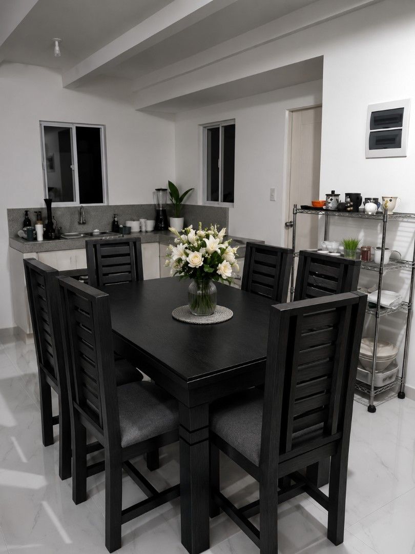 Dark Wood Dining Table with 6 Chairs and Bench (Category: Tables & Sets) located in Mabalacat. Submitted by joemamangun01 (Listing ID 1440957882, Image 2). Description: Selling a dark wood dining set. Includes a long table, six chairs with upholstered seats, and a matching bench. Seats up to 8 people comfortably. Great for family dinners or entertaining guests. The dark finish is sleek and modern. Chairs have a slatted back design. Bench offers f