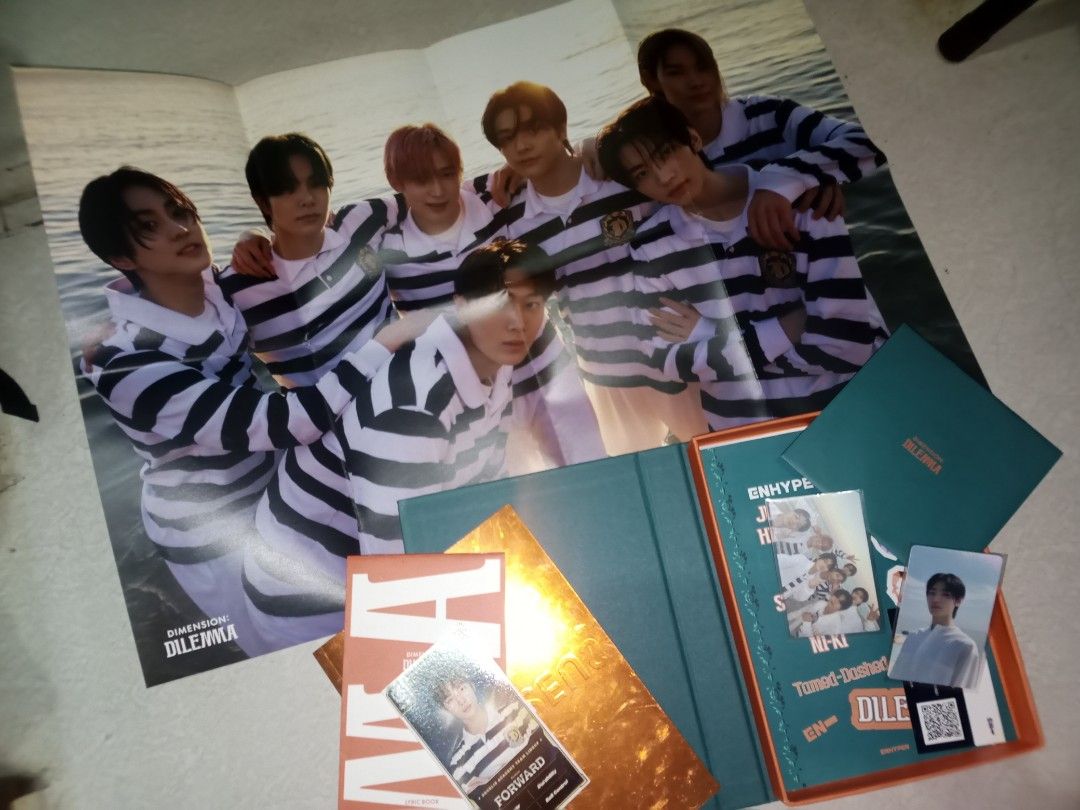 Enhypen Dimension Dilemma K-pop Album (Category: Fan Merchandise) located in Manila. Submitted by rareflower_8e37d5 (Listing ID 1440979479, Image 2). Description: Complete with poster and 2 official photo cards (OT7 & Sunghoon).