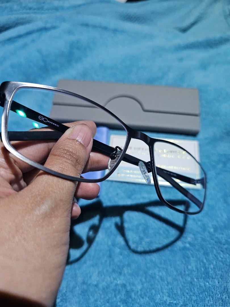 EO Eyewear Glasses with Case and Cloth (Category: Sunglasses & Eyewear) located in Caloocan City. Submitted by yaeikko (Listing ID 1441058524, Image 2). Description: - Brand: EO Eyewear - Frame Color: Silver - Frame Shape: Modern Rectangular - Included Accessories: Hard case, cleaning cloth - Special Offer: Free lifetime services card - Ideal For: Everyday wear - Brandnew, never worn, no scratches - No eyegrade Original Price: 4,990 RFS: I have a