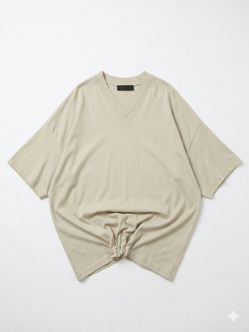 Fear of God Essentials Beige V-Neck T-Shirt Size S (Category: Tshirts & Polo Shirts ) located in Caloocan City. Submitted by vincefresn21903 (Listing ID 1440954546, Image 1). Description: - Brand: Essentials - Color: Beige - Neckline: V-neck - Material: 100% Cotton - Fit: Boxy Fit - Features: Tie detail at hem - Size: Tagged Small best fit to XL - Style: Versatile staple piece - Excellent Condition.