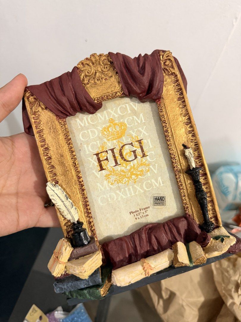 FIGI branded tabletop photo frame featuring a baroque design (Category: Frames & Pictures) located in Quezon City. Submitted by cookiecreammm (Listing ID 1441120053, Image 3). Description: .