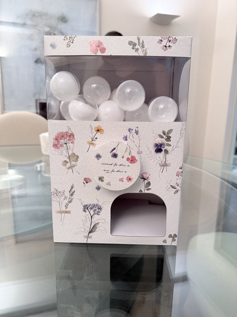 Floral Cardboard Gashapon (Category: Other Home Decor) located in Muntinlupa City. Submitted by silentfire.13aadb (Listing ID 1440958484, Image 1). Description: Cute floral gashapon-style dispenser with reusable capsules for loose-leaf tea, herbs, candies, or small treats. Fill each capsule and enjoy a fun surprise selection every time! ✔️ Includes reusable capsules ✔️ Perfect for tea lovers & gifts ✔️ Decorative floral design ✔️ Great for tea, h