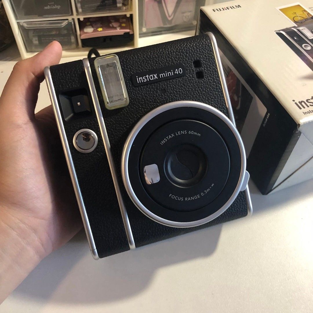 Fujifilm Instax Mini 40 (Category: Cameras) located in Bulacan. Submitted by jalehhhh (Listing ID 1440984764, Image 1). Description: RUSH SALE FUJIFILM INSTAX MINI 40 POLAROID CAMERA MINT CONDITION, USED ONLY 3 TIMES INC: STRAP, BOX AND MANUAL 📍BULACAN PM IF INCH, CAN SEND VIDS AND PICS.