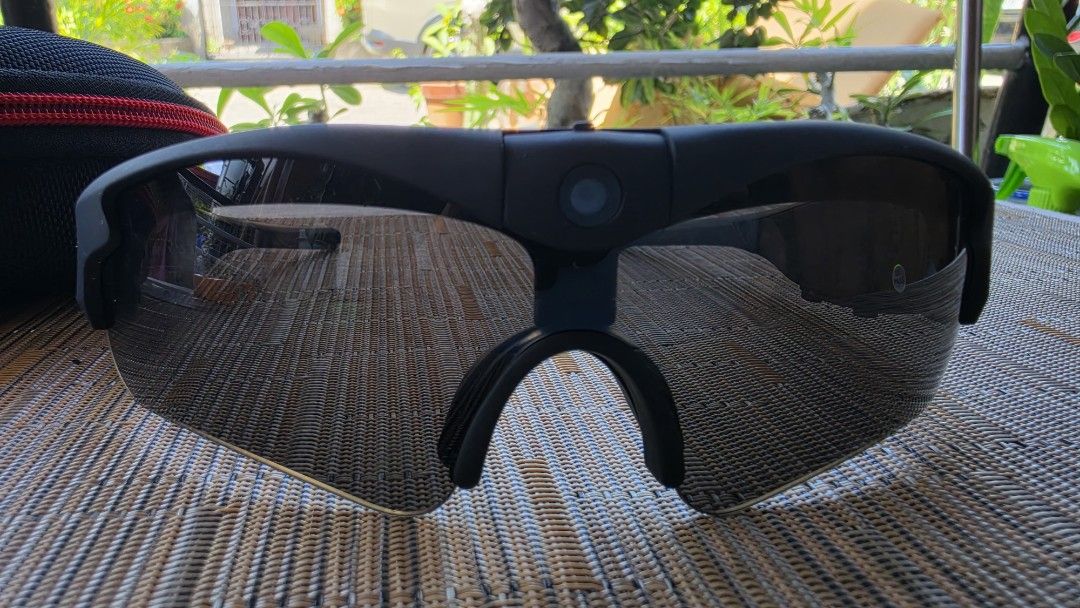GOGLOO HD 1080P Smart Glasses with Case (Category: Sunglasses & Eyewear) located in Naga. Submitted by solamia (Listing ID 1440963296, Image 3). Description: - GOGLOO Smart Glasses - Records in HD 1080P - Stylish black frame with tinted lenses - Perfect for capturing moments hands-free - Includes protective case, charging cable, and cleaning cloth - All accessories as pictured.