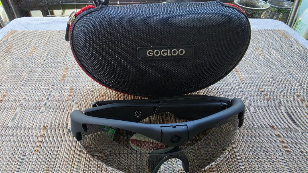 GOGLOO HD 1080P Smart Glasses with Case (Category: Sunglasses & Eyewear) located in Naga. Submitted by solamia (Listing ID 1440963296, Image 1). Description: - GOGLOO Smart Glasses - Records in HD 1080P - Stylish black frame with tinted lenses - Perfect for capturing moments hands-free - Includes protective case, charging cable, and cleaning cloth - All accessories as pictured.