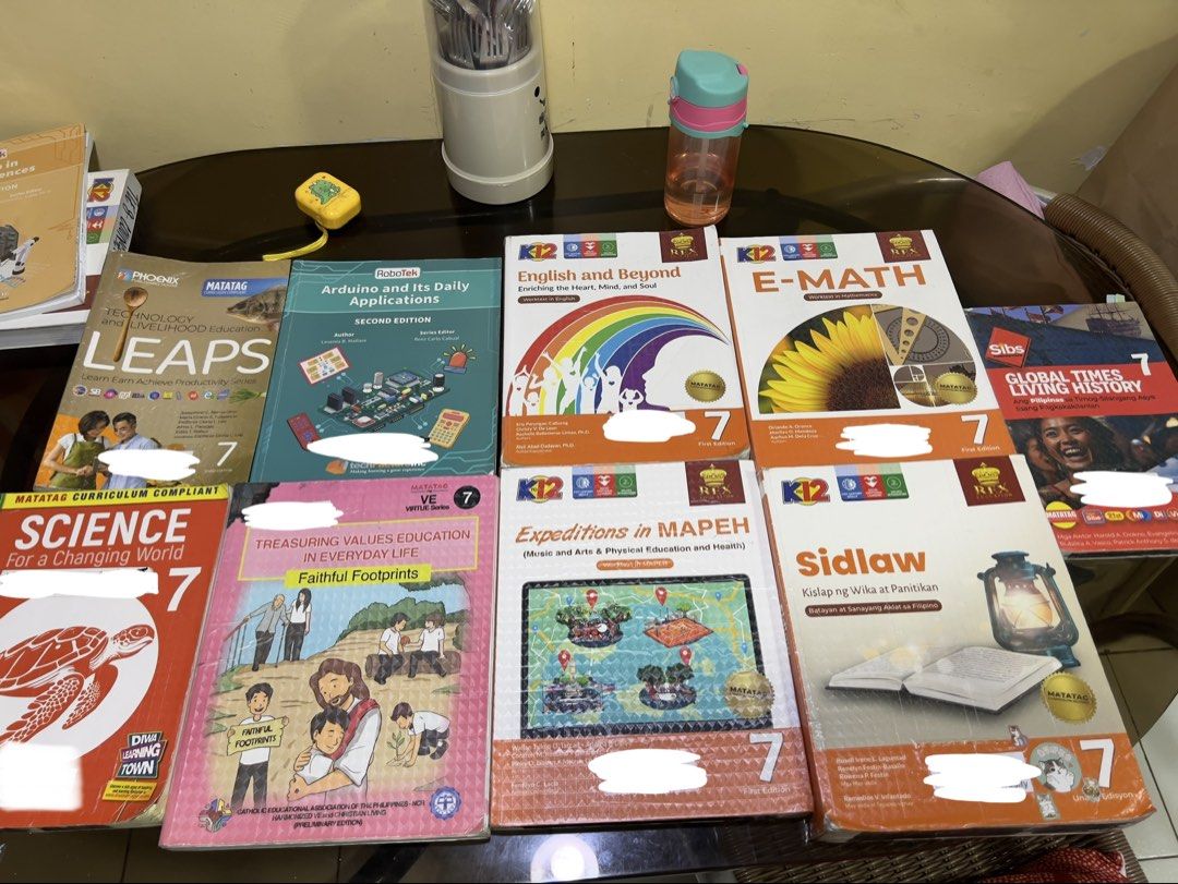 Grade 7 K-12 Textbooks - Various Subjects (Category: Textbooks) located in Quezon City. Submitted by sjlsrolling (Listing ID 1441013822, Image 1). Description: - Grade 7 Textbook Bundle (2024 Edition) - Subjects: E-Math, Science, English and Beyond, Values Education, Expeditions in MAPEH, Sidlaw, Global Times Living History, LEAPS - Publishers include Phoenix, Matador, and DIWA - All books are the latest 2024 editions - Ideal for students needing