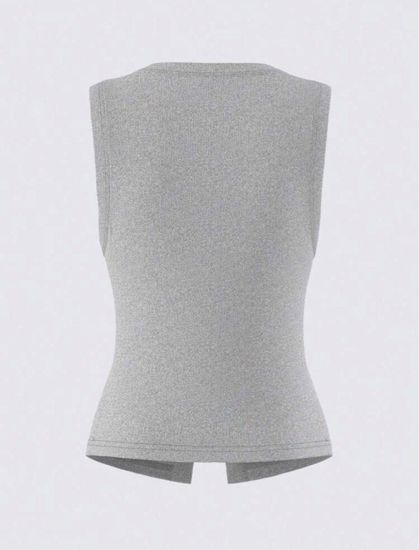 Grey Ribbed Button-Up Sleeveless Tank Top (Category: Sleeveless) located in Caloocan City. Submitted by julyuuhhh (Listing ID 1441117720, Image 2). Description: - Grey ribbed tank top - Sleeveless design - Button-up front - Super soft and cozy feel - Flattering fit - Ideal for layering or wearing solo - Perfect for casual outfits.