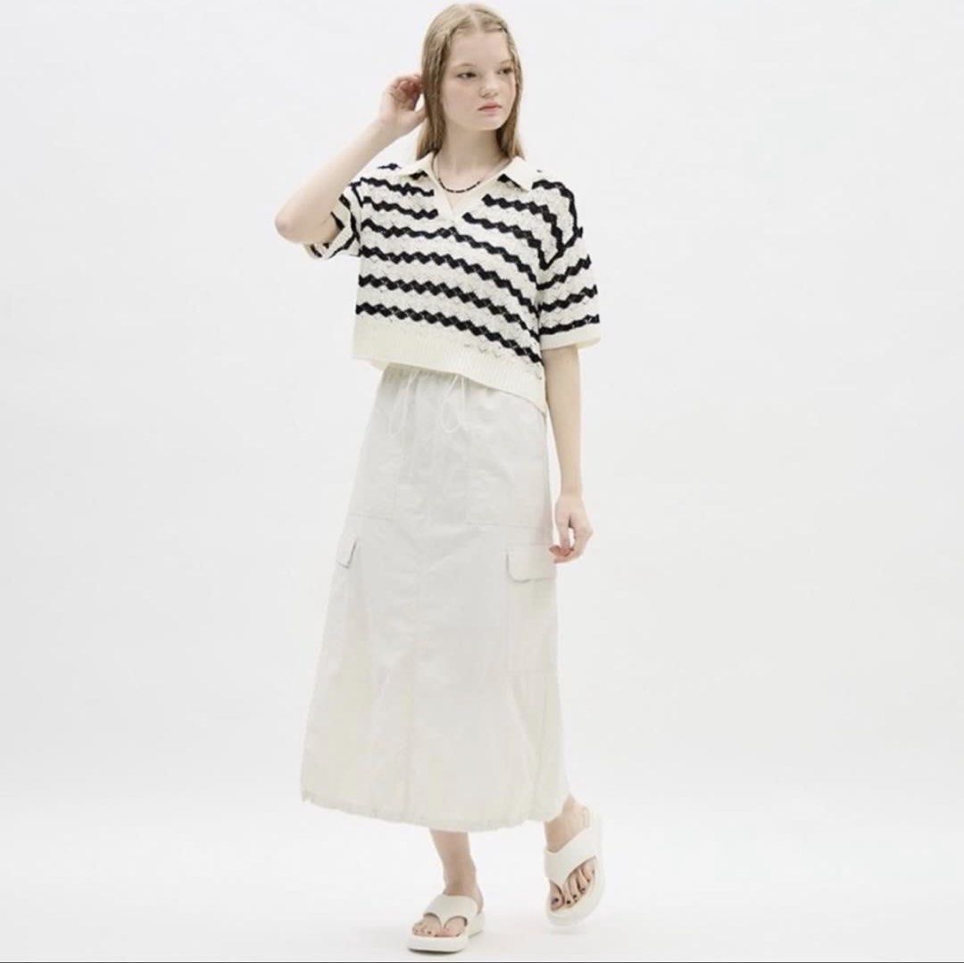 GU Uniqlo - Tech Nylon Long Skirt (Category: Skirts) located in Los Banos. Submitted by declutterking (Listing ID 1441125923, Image 1). Description: Size Medium on tag • 2 side pockets • back center slit Dimensions: 12.75" waist 33" length 21.75" hem Good as new condition Authentic.