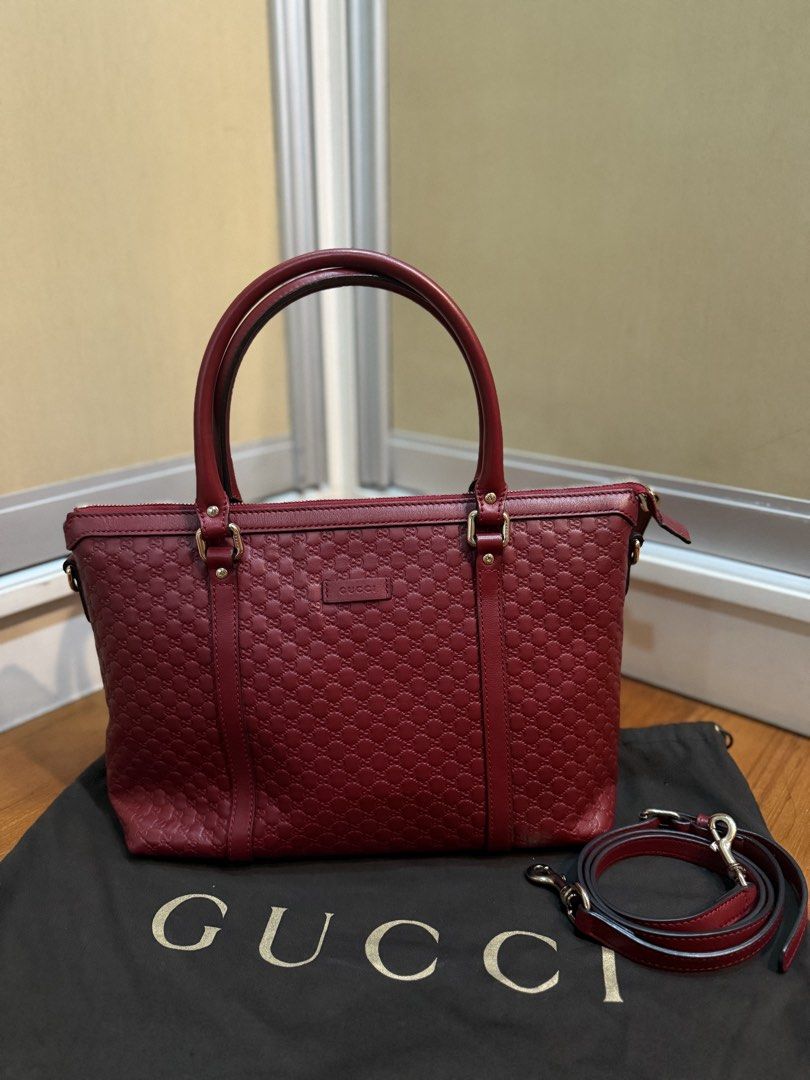 Gucci Microguccissima Leather Tote Bag (Category: Luxury Bags & Wallets) located in Quezon City. Submitted by calea (Listing ID 1441121222, Image 1). Description: Authentic Gucci Microguccissima tote bag in red color - comes with dustbag - in excellent used condition, clean interior!, minor scuffs at the corners but barely noticeable - with detachable shoulder strap - has secure zipper closure so perfect for travels! - multiple interior pockets f