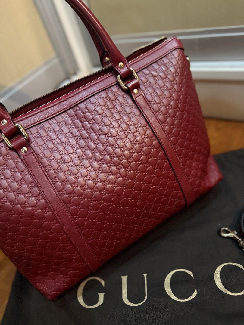 Gucci Microguccissima Leather Tote Bag (Category: Luxury Bags & Wallets) located in Quezon City. Submitted by calea (Listing ID 1441121222, Image 3). Description: Authentic Gucci Microguccissima tote bag in red color - comes with dustbag - in excellent used condition, clean interior!, minor scuffs at the corners but barely noticeable - with detachable shoulder strap - has secure zipper closure so perfect for travels! - multiple interior pockets f