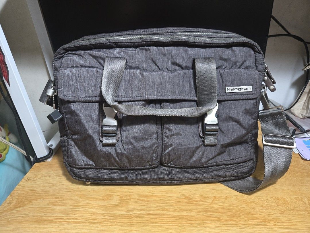 Hedgren Laptop Bag with Sling 15in. (Category: Briefcases) located in Quezon City. Submitted by karlleseshops (Listing ID 1441059242, Image 1). Description: - Condition: slightly used - Double Carry Wrapped Handles and Adjustable Shoulder Strap - Black Cube Hanger - Genuine Black Leather Trims - Zipper Closure - Multiple Zipper and Pocket Compartments for Organization and Stowage - Material Nylon - Dimensions 4.7" X 15.6" X 11.8; all approx. - It