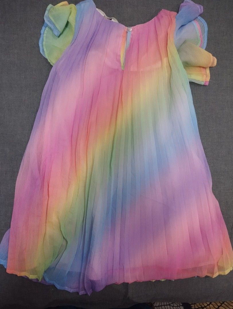 H&M Rainbow Pleated Dress Girls Size 6 UK (Category: Babies & Kids Fashion) located in Batangas. Submitted by nartleb_naan (Listing ID 1441104415, Image 2). Description: Preloved - Adorable rainbow pleated dress from H&M - Features charming flutter sleeves - Versatile: perfect for parties or everyday wear - Easy to put on with a back keyhole closure - Ideal for summer fun sf not included pm interested .
