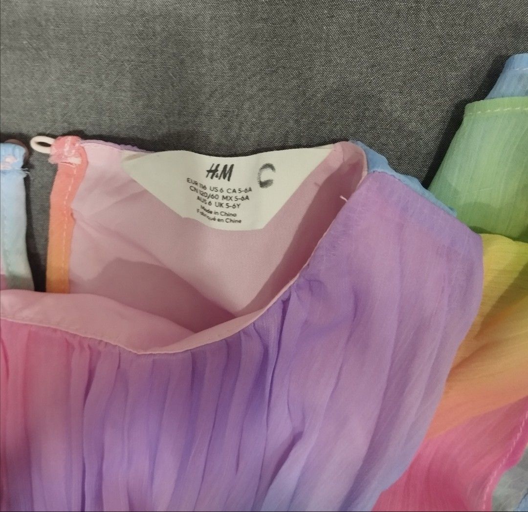 H&M Rainbow Pleated Dress Girls Size 6 UK (Category: Babies & Kids Fashion) located in Batangas. Submitted by nartleb_naan (Listing ID 1441104415, Image 3). Description: Preloved - Adorable rainbow pleated dress from H&M - Features charming flutter sleeves - Versatile: perfect for parties or everyday wear - Easy to put on with a back keyhole closure - Ideal for summer fun sf not included pm interested .