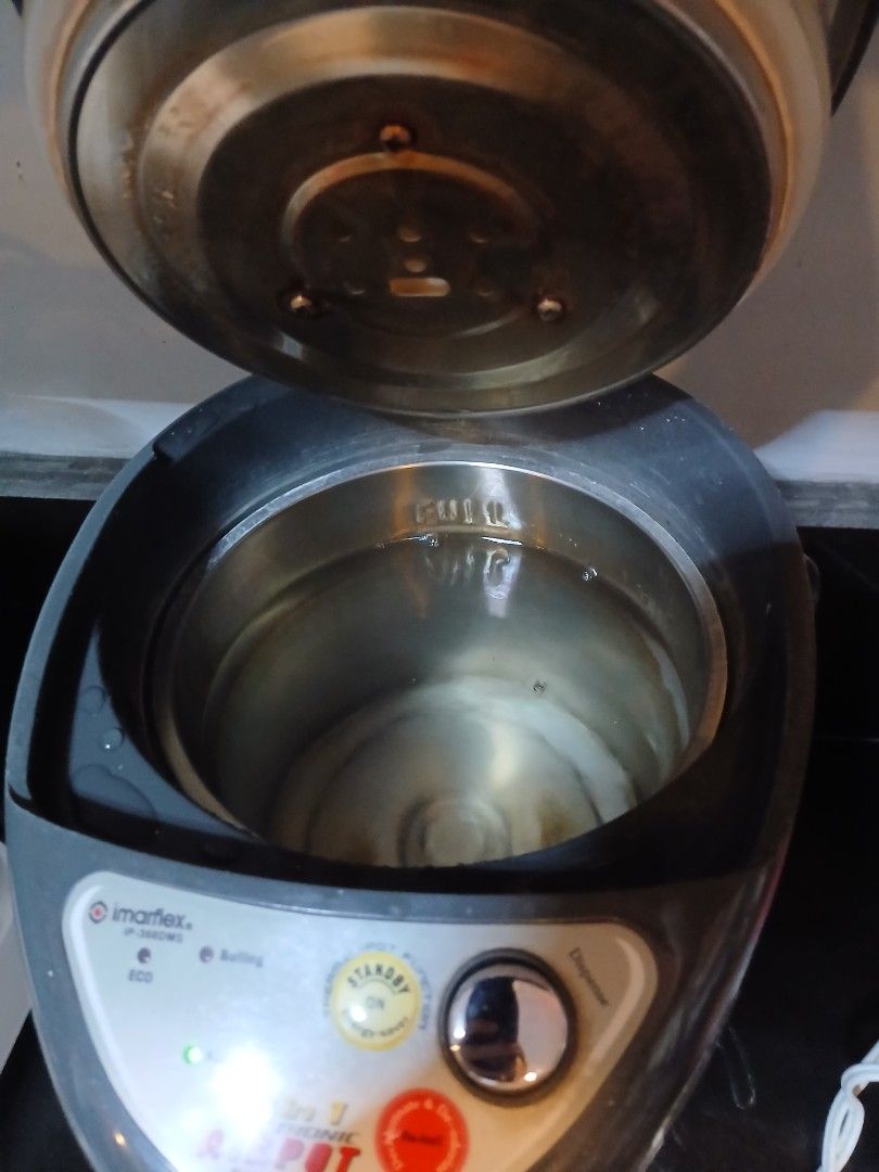 Imarflex Electronic Air Pot 3.6L (Category: Cookers) located in Manila. Submitted by jacquelinelimcheng1982.jc (Listing ID 1441055383, Image 2). Description: - Imarflex Electronic Air Pot - 3.6 Liter Capacity - 2-in-1 Dispensing System - Blue Water Level Indicator - Excellent Working Condition - Perfect for keeping water hot.