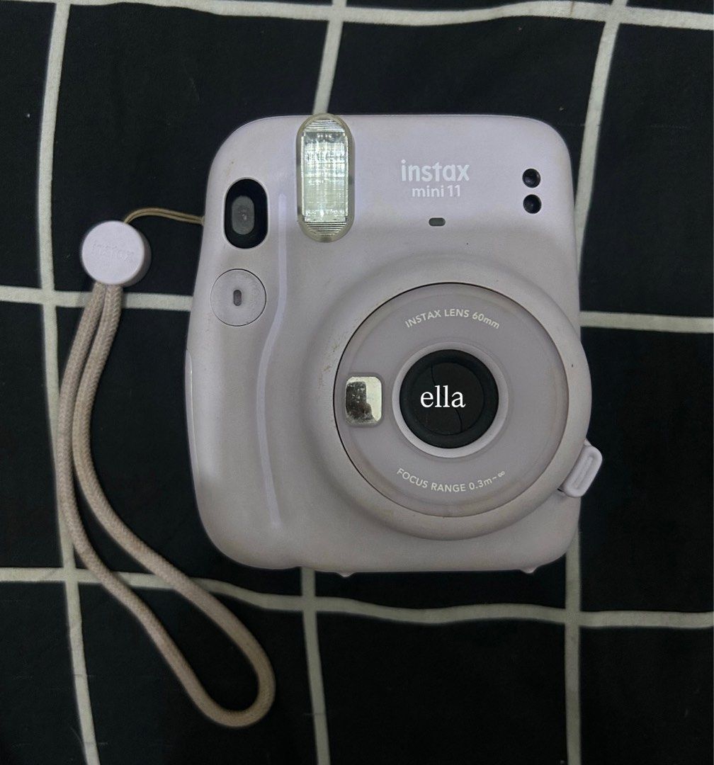 Instax Mini 11 (Category: Cameras) located in Quezon City. Submitted by spicynoodleszup (Listing ID 1441083835, Image 1). Description: Check photos to see the cam condition. Hindi na nagagamit kaya naluma na but u can buy case to make it presentable again naman or deep clean lang. But when it comes sa mismong camera SOLID 10/10 working. Alkaline battery W box.