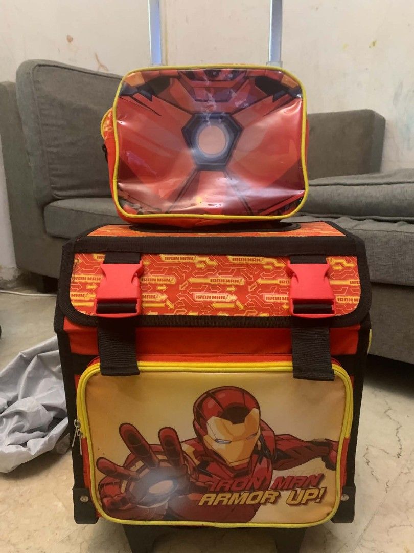 Iron Man Rolling Backpack, Lunch Bag, Pencil Case & Water Bottle (Category: Backpacks) located in Manila. Submitted by missusmarinas2914 (Listing ID 1440991439, Image 1). Description: - Cool Iron Man rolling backpack set for kids. - Includes matching lunch bag, pencil case, and AquaFlask water bottle. - Perfect for school or travel adventu - Features iconic Iron Man and Avengers logos. - Spacious interior for books and school supplies. - Backpack