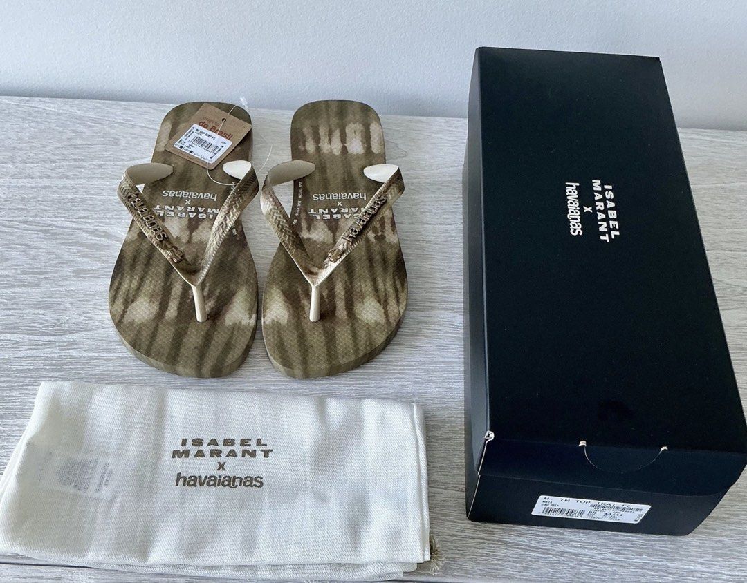 Isabel Marant x Havaianas Flip-Flops with Pouch and Box (Category: Slippers and slides) located in Mandaluyong City. Submitted by envoguevintage88 (Listing ID 1441078644, Image 1). Description: SOLD OUT AND IMPOSSIBLE TO GET MEGA TRENDING - Authentic Isabel Marant x Havaianas collaboration - Unique tie-dye pattern - Comes with original dust bag and box - Ideal for beach days and everyday casual style - A must-have for fashion-forward comfort!.