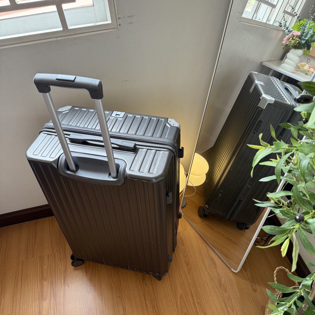 Island Elephant Luggage 28inches (Category: Luggage) located in Mabalacat. Submitted by pauwieee12 (Listing ID 1441024128, Image 3). Description: - Dark grey aluminum suitcase - Features TSA combination lock - Smooth rolling wheels - Retractable handle for easy transport - Minor scuffs from normal use - Perfect for your next adventure - 28 inches.
