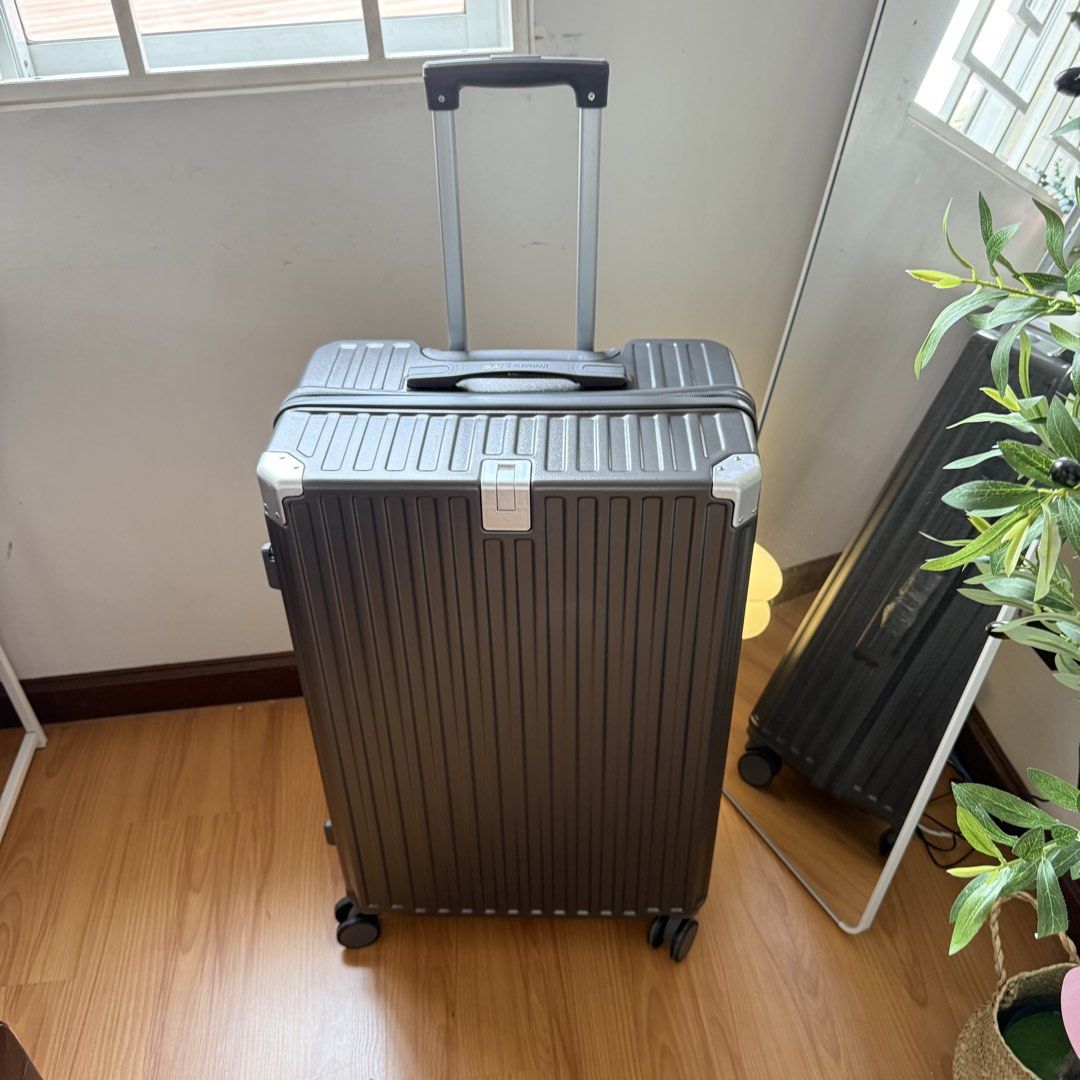 Island Elephant Luggage 28inches (Category: Luggage) located in Mabalacat. Submitted by pauwieee12 (Listing ID 1441024128, Image 2). Description: - Dark grey aluminum suitcase - Features TSA combination lock - Smooth rolling wheels - Retractable handle for easy transport - Minor scuffs from normal use - Perfect for your next adventure - 28 inches.