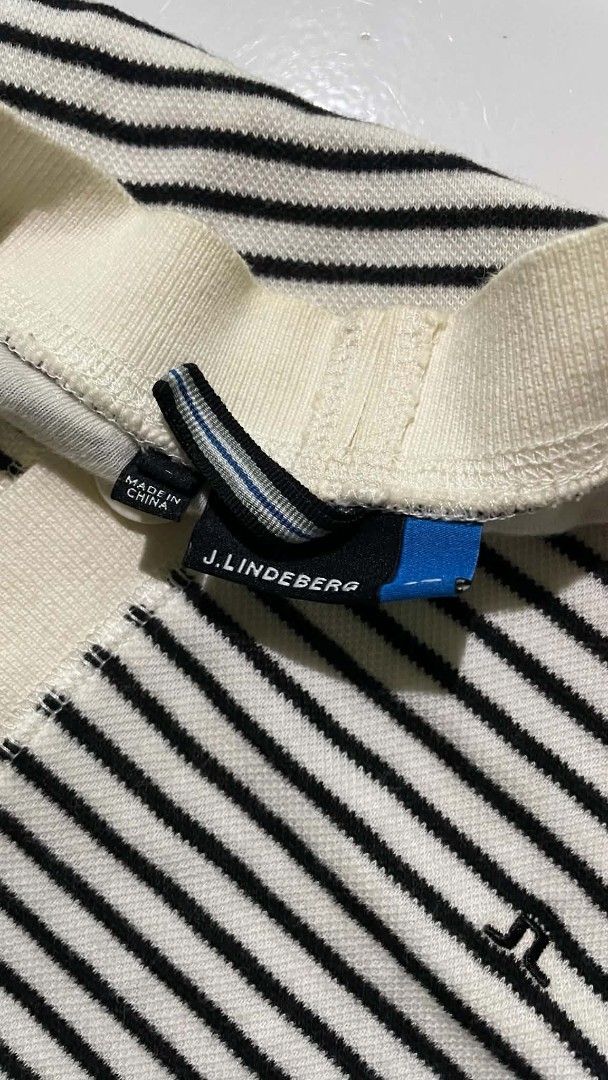 J. Lindeberg Striped Cardigan (Category: Coats, Jackets and Outerwear) located in Barotac Nuevo. Submitted by gray101 (Listing ID 1441105764, Image 2). Description: - J. Lindeberg cardigan - Black and white stripes with cream trim - Button-up front - Ideal for layering - Made in China.