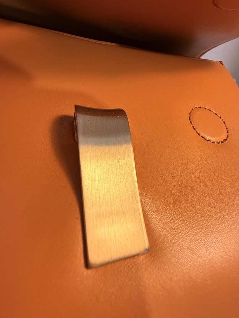 Joy Gryson Leather Clutch Bag - Tan (Category: Clutches) located in Dasmarinas. Submitted by gemini_things (Listing ID 1441027628, Image 3). Description: Selling my Joy Gryson bag Like new condition Minimal flaw in the magnet area, unused for a very long time Great bag if you want a pop of color - Brand: Joy Gryson - Material: Tan Leather - Closure: Gold-tone clasp - Interior: Zippered pocket - Details: Exquisite stitching on flap - Occasion: Ide