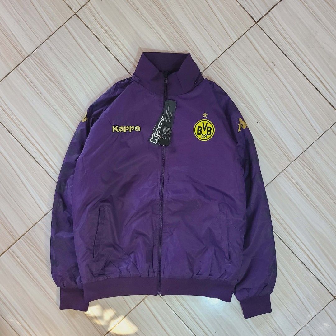 Kappa X Borussia Dortmund BVB Purple Track Jacket (Category: Coats, Jackets and Outerwear) located in Caloocan City. Submitted by silentmoon.dedce6 (Listing ID 1440979073, Image 1). Description: - Authentic purple Kappa track jacket - Features official Borussia Dortmund (BVB) logo - Kappa logo present on chest and sleeve - Full zip closure with a stylish stand-up collar - Comfortable ribbed cuffs and hem - Perfect for any dedicated BVB supporter.