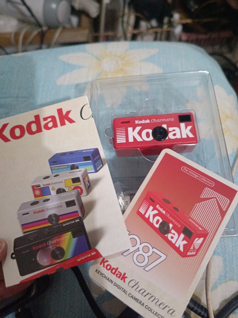 Kodak Charmera Keychain Digital Camera 1987 Edition (Category: Cameras) located in Rizal. Submitted by elsie1206 (Listing ID 1440975431, Image 2). Description: - Authentic 1987 Kodak Charmera keychain digital camera - Inspired by the classic Kodak Fling design - Comes in a collectible blind box with 7 different styles to discover - Perfect for collectors or as a unique retro gadget.